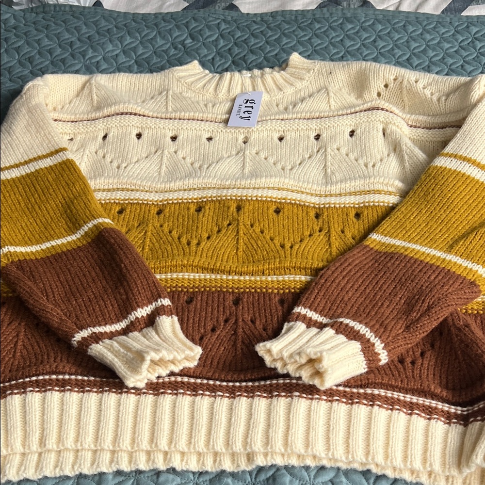 Elegant Knit Sweater in Cream, Gold, and Brown